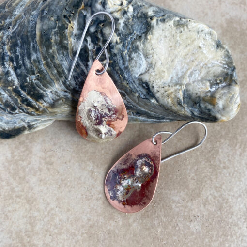 Mixed metal copper and silver oval planet earrings