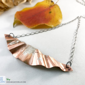 mixed metal northern lights necklace
