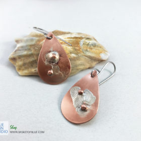 planet earrings mixed metal copper and silver