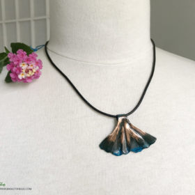 copper patina mermaid tail necklace