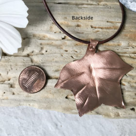 copper verdigris painted tulip tree leaf pendant