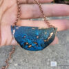 copper patina half moon necklace