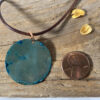 copper patina disc pendant