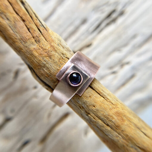 copper and bronze mixed metal ring with round iolite stone