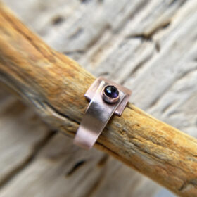 copper and bronze mixed metal ring with round iolite stone
