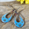 blue open oval enamel earrings