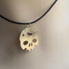 brass skull red garnet pendant